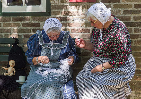 Henk Terhell - The Gordian Knot (Women in traditional clothing at a local event.)